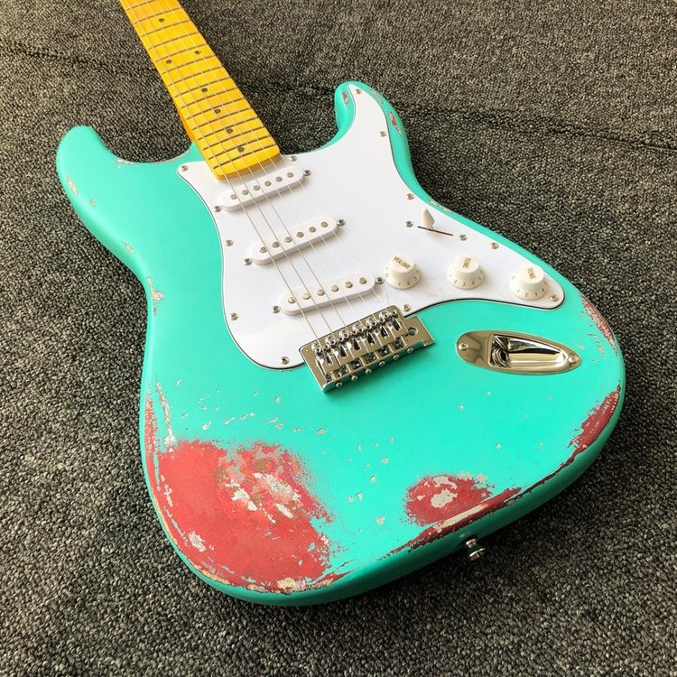 Relic-Electric-Guitar-surf-green-with-pink-paisley-Vintage-electric-guitar.jpg